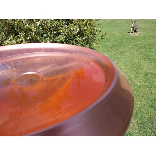 62 - Contemporary copper bird bath. {10 cm H x 50 cm Dia.}