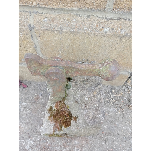 254 - 19th. C.  cast iron door stop mounted in a stone base.  NOT AVAILABLE TO VIEW IN PERSON