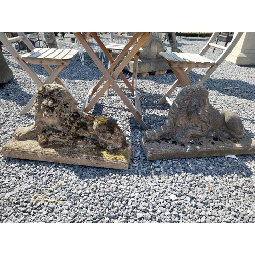 166 - Pair of weathered composition flat back Lions. {41 cm H x 72 cm W x 18 cm D}.