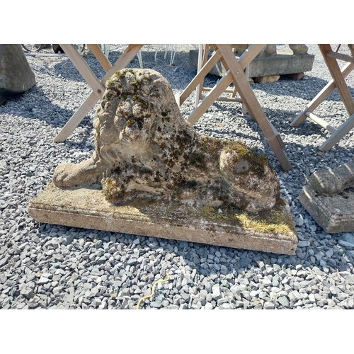 166 - Pair of weathered composition flat back Lions. {41 cm H x 72 cm W x 18 cm D}.