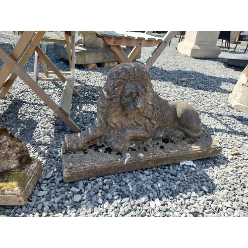 166 - Pair of weathered composition flat back Lions. {41 cm H x 72 cm W x 18 cm D}.