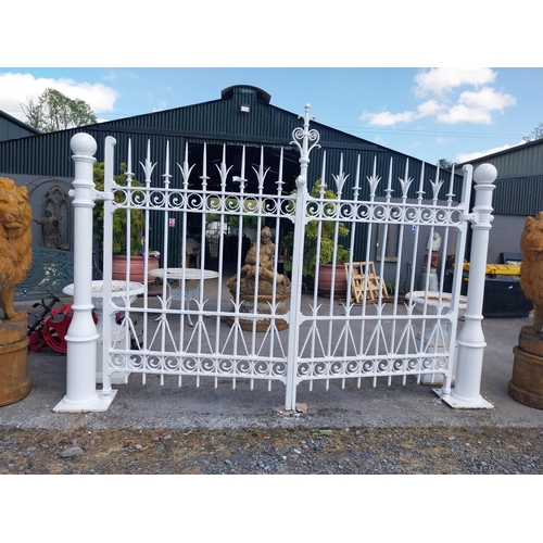 Exceptional quality 19th C. wrought iron hand forged entrance gates with posts. {240 cm H x 370 cm W x 40 cm D}.