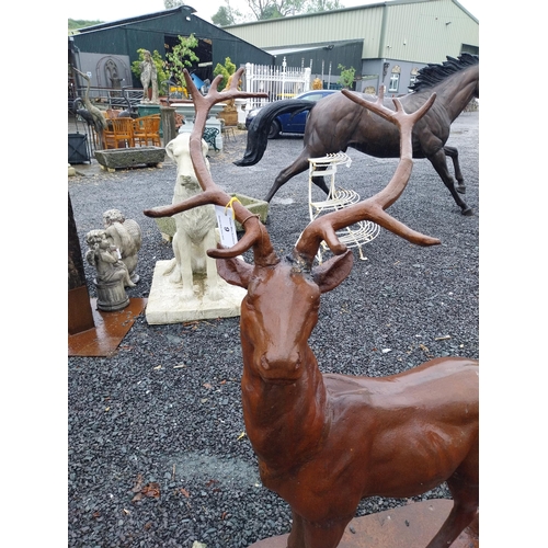 9 - Cast iron Stag on plinth. {150 cm H x 100 cm W x 42 cm D}.