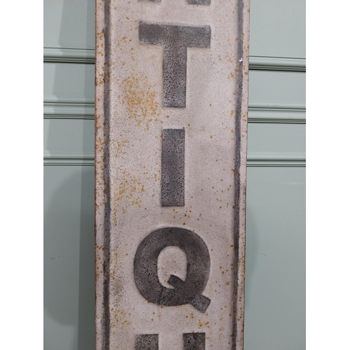37 - Metal Antiques sign. {191 cm H x 33 cm W}.