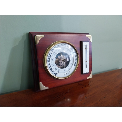 21 - German mahogany and brass barometer {17 cm H x 21 cm W}.