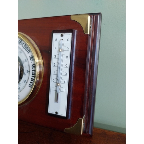 21 - German mahogany and brass barometer {17 cm H x 21 cm W}.