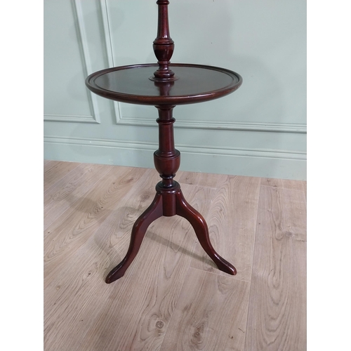 58 - Good quality mahogany three tiered dumbwaiter in the Georgian style {98 cm H x 35 cm Dia.}.
