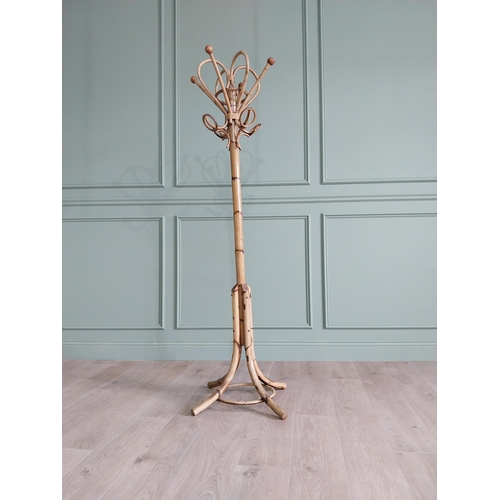 34 - 1950s bamboo hat and coat stand {180 cm H x 42 cm Dia.}.