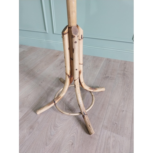 34 - 1950s bamboo hat and coat stand {180 cm H x 42 cm Dia.}.