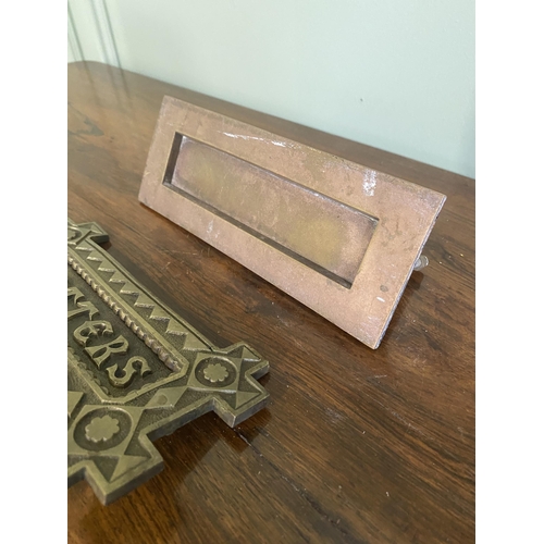 33 - Two early 20th C. brass door letter boxes {8 cm H x 20 cm W x 6 cm D and 9 cm W x 19 cm W}.