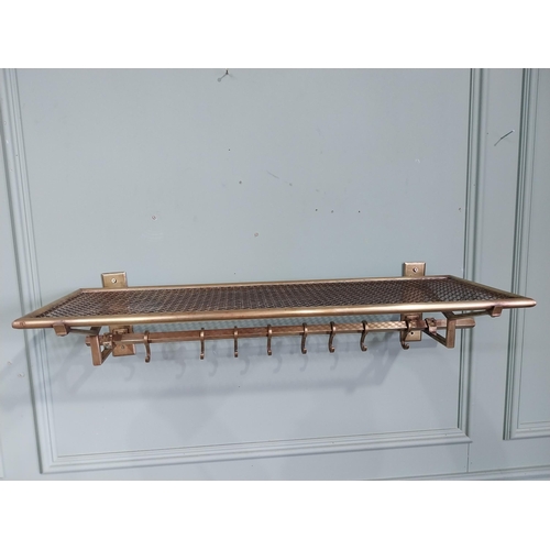 10 - Art Deco brass luggage rack. {19 cm H x 80 cm W x 30 cm D}.