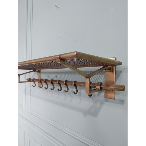 10 - Art Deco brass luggage rack. {19 cm H x 80 cm W x 30 cm D}.