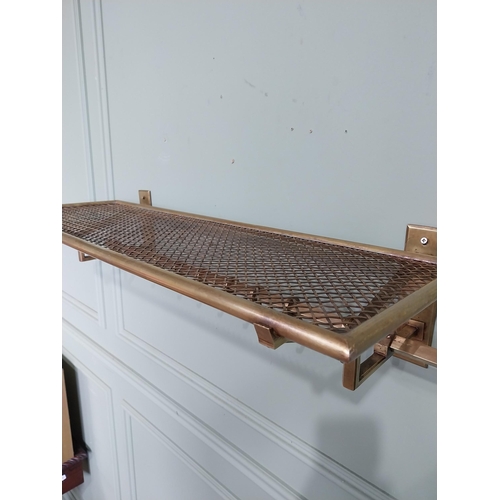 10 - Art Deco brass luggage rack. {19 cm H x 80 cm W x 30 cm D}.