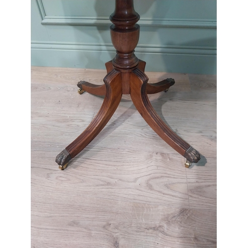 11 - Good quality mahogany octagonal lamp table with inset leather top and short drawers in frieze on tur... 