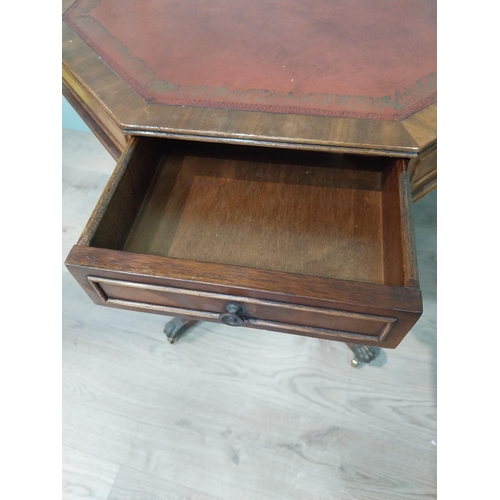 11 - Good quality mahogany octagonal lamp table with inset leather top and short drawers in frieze on tur... 