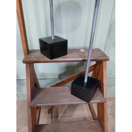 20 - Two mid century hat blocks. {65 cm H x 17 cm W x 20 cm D} and {54 cm H x 17 cm W x 20 cm D}.