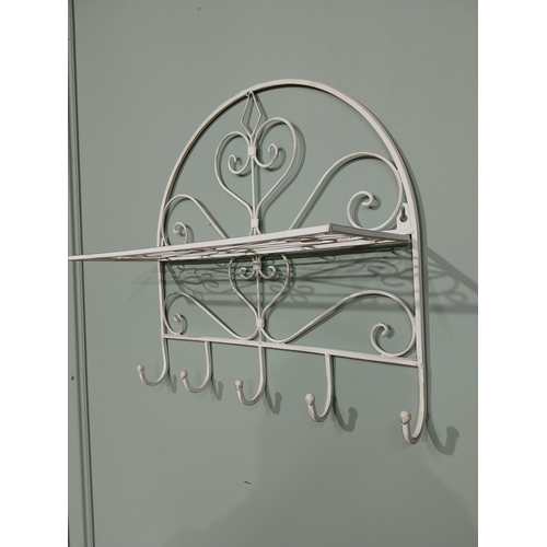 24 - Wrought iron wall hanging pot rack. {45 cm H x 46 cm W x 18 cm D}