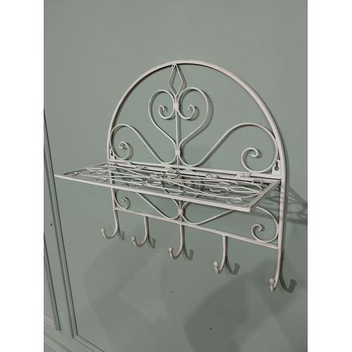 24 - Wrought iron wall hanging pot rack. {45 cm H x 46 cm W x 18 cm D}