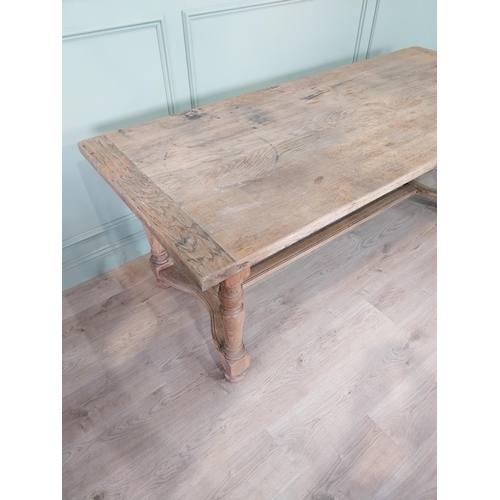 27 - Good quality early 20th C. bleached oak kitchen table on turned legs and single stretcher. {77 cm H ... 
