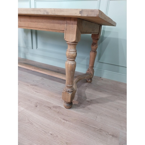 27 - Good quality early 20th C. bleached oak kitchen table on turned legs and single stretcher. {77 cm H ... 