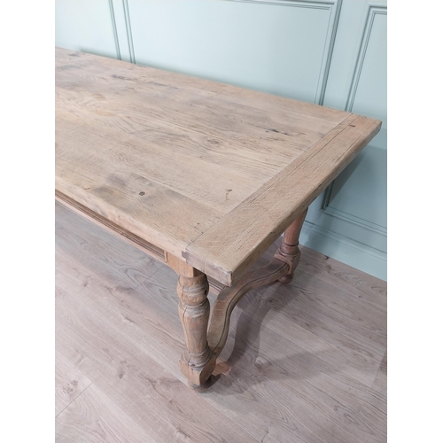 27 - Good quality early 20th C. bleached oak kitchen table on turned legs and single stretcher. {77 cm H ... 