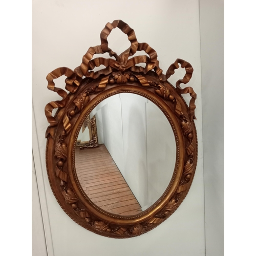 38 - Early 20th C.  Rococo style gilt wood oval bevel glass mirror {H 117cm x W 84cm x D 12cm } NOT AVAIL... 