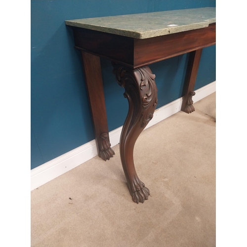 45 - William IV Irish mahogany console table with shaped marble top raised on carved legs on claw feet. {... 