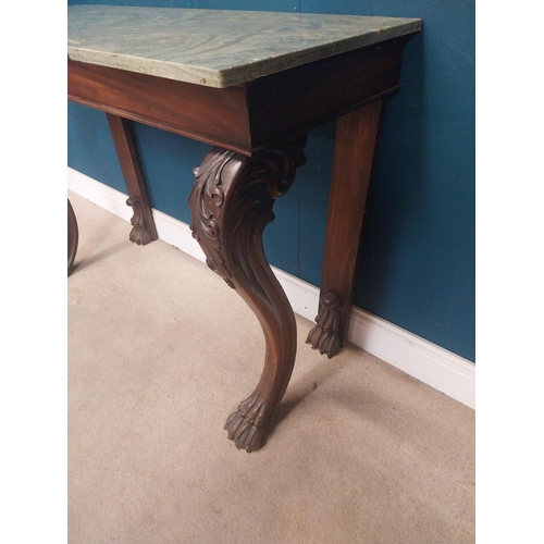 45 - William IV Irish mahogany console table with shaped marble top raised on carved legs on claw feet. {... 