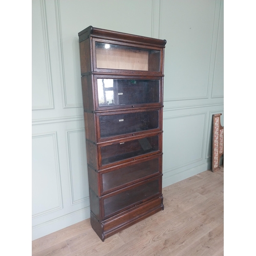47 - Early 20th C. oak Globe-Wiernicke stackable bookcase with glazed doors. {200 cm H x 87 cm W x 32 cm ... 
