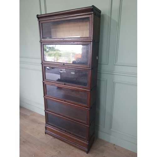 47 - Early 20th C. oak Globe-Wiernicke stackable bookcase with glazed doors. {200 cm H x 87 cm W x 32 cm ... 
