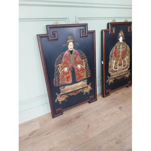 49 - Pair of decorative hardwood Oriental panels depicting Emperors. {105 cm H x 66 cm W}.