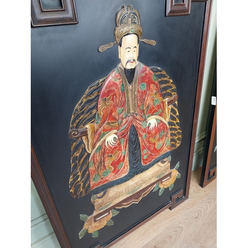 49 - Pair of decorative hardwood Oriental panels depicting Emperors. {105 cm H x 66 cm W}.