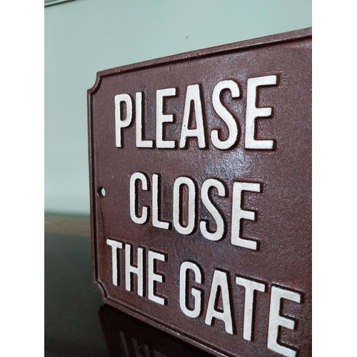 52 - Cast iron Please close the gate sign. {18 cm H x 19 cm W}.