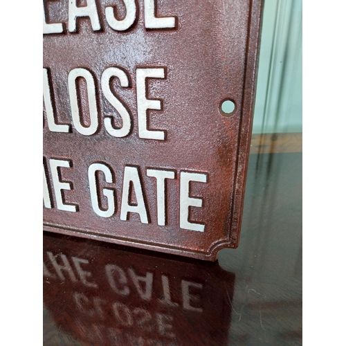 52 - Cast iron Please close the gate sign. {18 cm H x 19 cm W}.