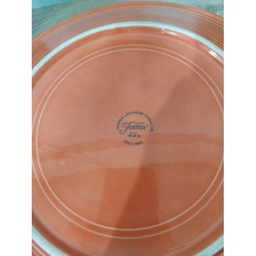 59 - Seven pieces of Fiesta ware - five plates and two water jugs. {30 cm Dia.} and {32 cm H x 23 cm W x ... 