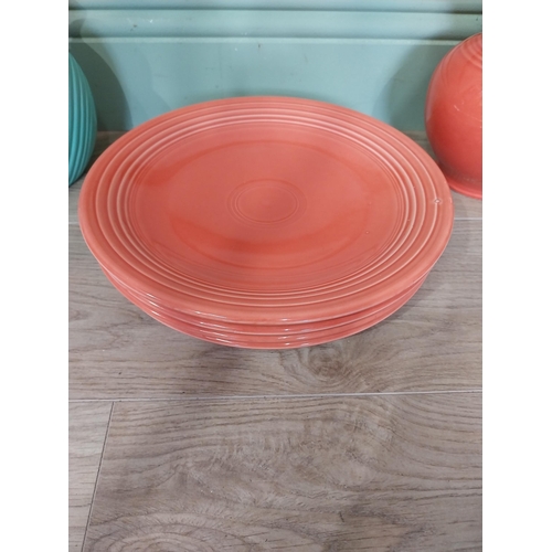 59 - Seven pieces of Fiesta ware - five plates and two water jugs. {30 cm Dia.} and {32 cm H x 23 cm W x ... 