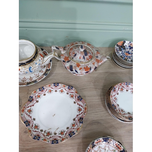 61 - Collection of thirty seven oriental ceramic plates, saucers and tea pots by Royal Stafford, Royal Ta... 