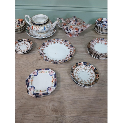 61 - Collection of thirty seven oriental ceramic plates, saucers and tea pots by Royal Stafford, Royal Ta... 