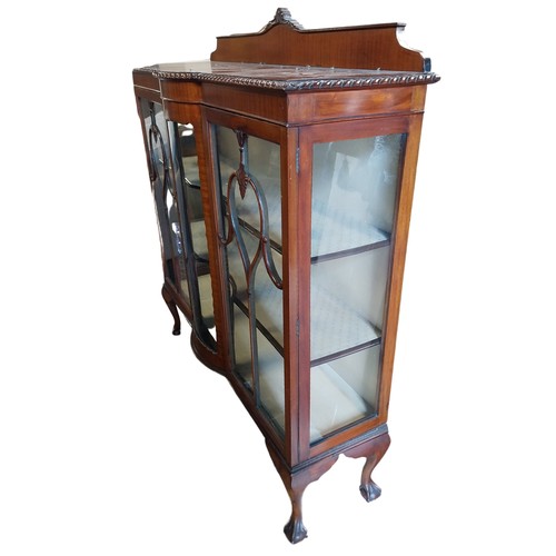 23A - Edwardian mahogany display cabinet on ball and claw feet. {144 cm H x 122 cm W x 40 cm D}.