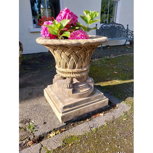 10 - Pair of good quality moulded terracotta lattice design urns, raised on platform bases and lion's paw... 