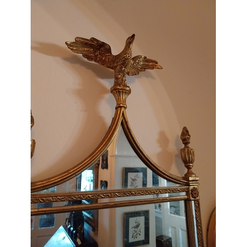 132 - Decorative giltwood pier mirror, surmounted with an Eagle, in the Regency manner. { 122cm H X 52cm W... 