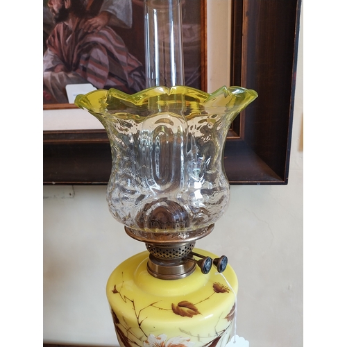 161 - 19th. C. brass oil lamp with yellow glass bowl and tulip shade. { 73cm H X 17cm Dia }.