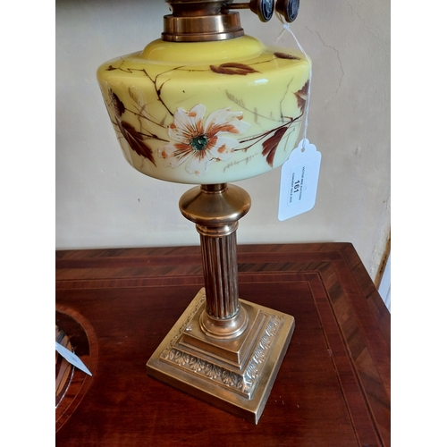 161 - 19th. C. brass oil lamp with yellow glass bowl and tulip shade. { 73cm H X 17cm Dia }.