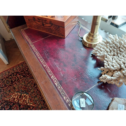 199 - Edwardian mahogany knee hole desk with inset tooled leather top, in the Chippendale manner. { 78cm H... 