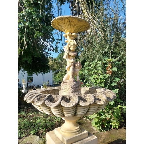 20 - Good quality moulded sandstone two tier fountain, decorated with Cherubs. { 230cm H X 120cm Dia }.
