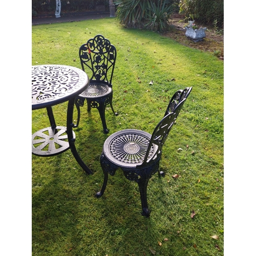 24 - Four piece cast iron garden set - Table { 73cm H X 66cm Dia } & two matching chairs { 80cm H X 40cm ... 