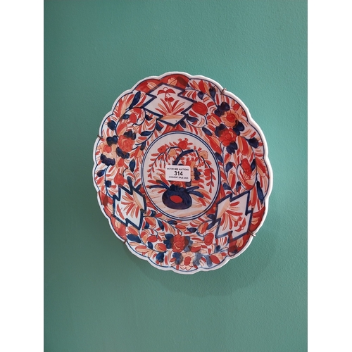 314 - Pair of early 20th. C. Imari ceramic plates { 25cm Dia }.