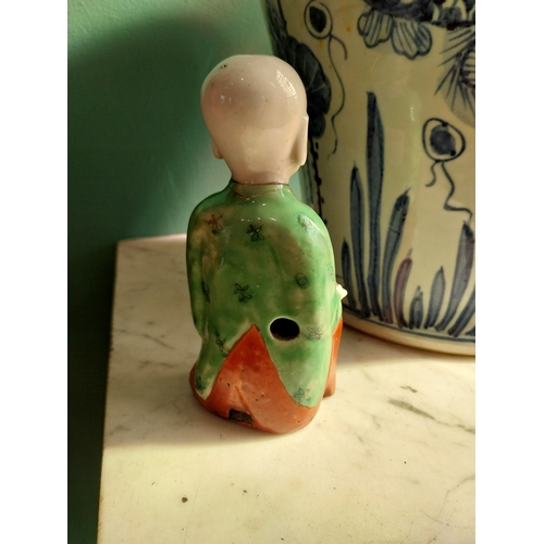 315 - Oriental glazed stone ware figure of a Gentleman. { 15cm H X 8cm W X 5cm D }.