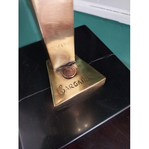 355 - Comtemporary bronze sculpture of a Helmet, mounted on a marble base.  { 47cm H X 22cm Sq. }.