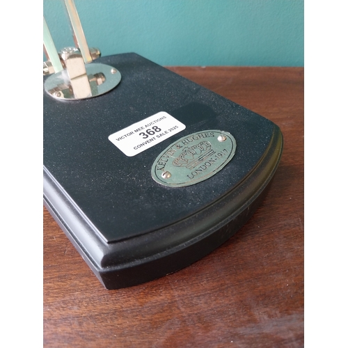 368 - Vintage chrome magnifying glass, mounted on ebonised base. { 24cm H X 12cm W X 17cm D }.
